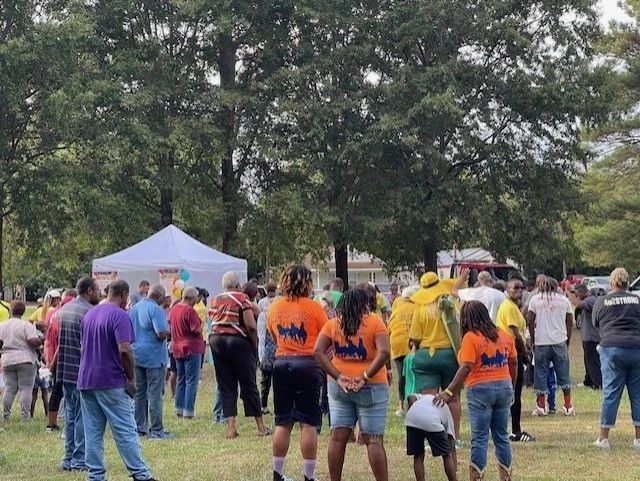 Community gathering at Changing Lives 365 outdoor event